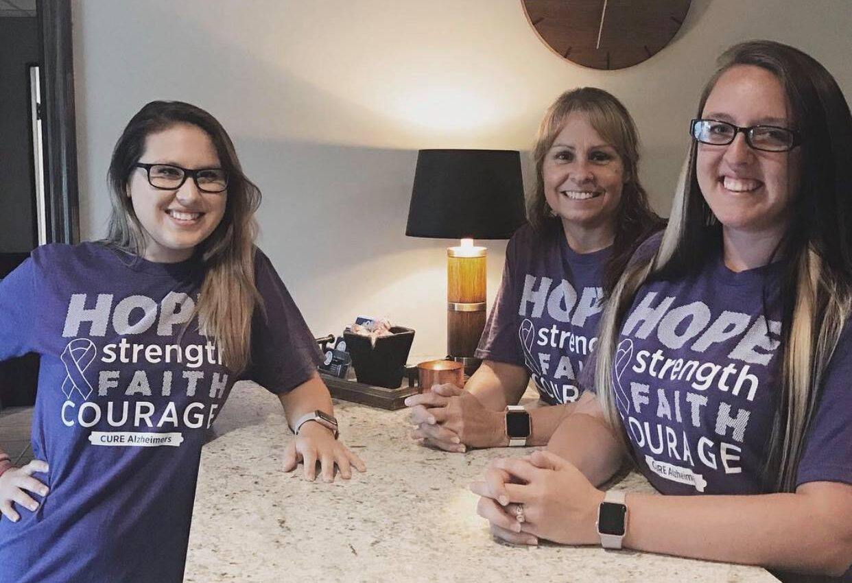 office ladies with alzheimer association shirts on