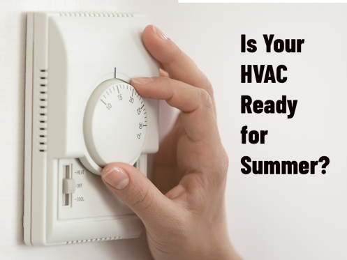homeowner adjusting thermostat